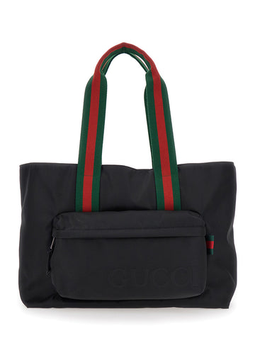 Gucci Men Black Tote Bag With Web Handles And Logo Lettering On The Front In Tech Fabric Man