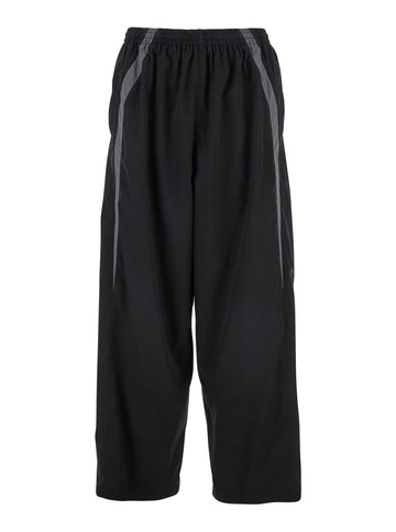 Balenciaga Men Black Oversized Tracksuit Pants With Contrasting Yokes In Tech Fabric Man
