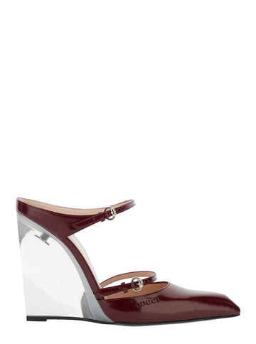 Gucci Women Red Mules With Embossed Logo Lettering On The Front And Transparent High Wedge Heel In Patent Leather Woman