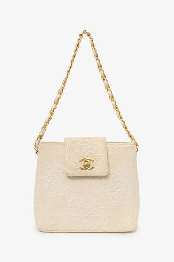 Chanel™ 1997-99 Beige Canvas Camellia Embroidered Bucket Bag (As Is)