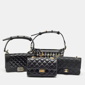 Black Quilted Leather SucceES Story Trunk and Set of 4 Mini Bags